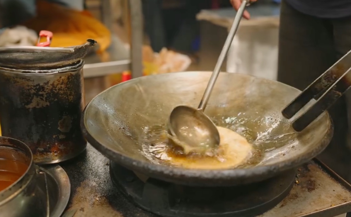 The Locked Doors of Delhi - 6: Food being prepared in a pan
