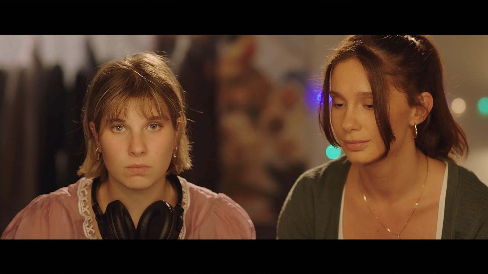 Between Worlds: Two women seated together