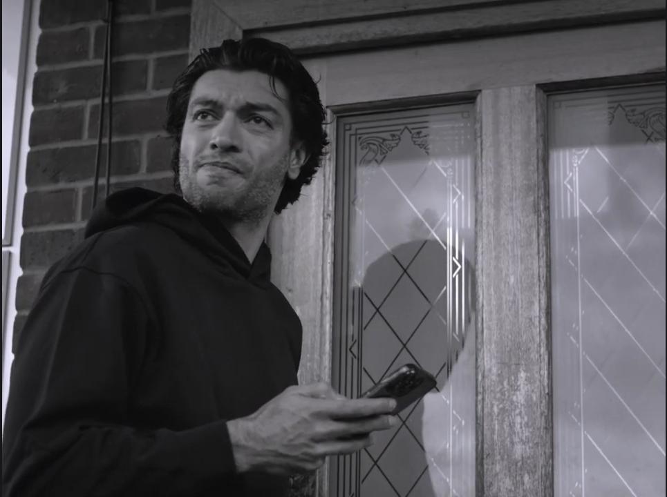Find My Phone: A man holding a phone outside