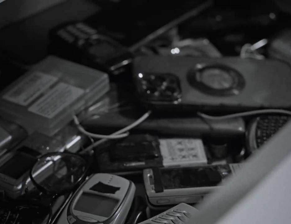 Find My Phone: Phones and equipment arranged on a surface