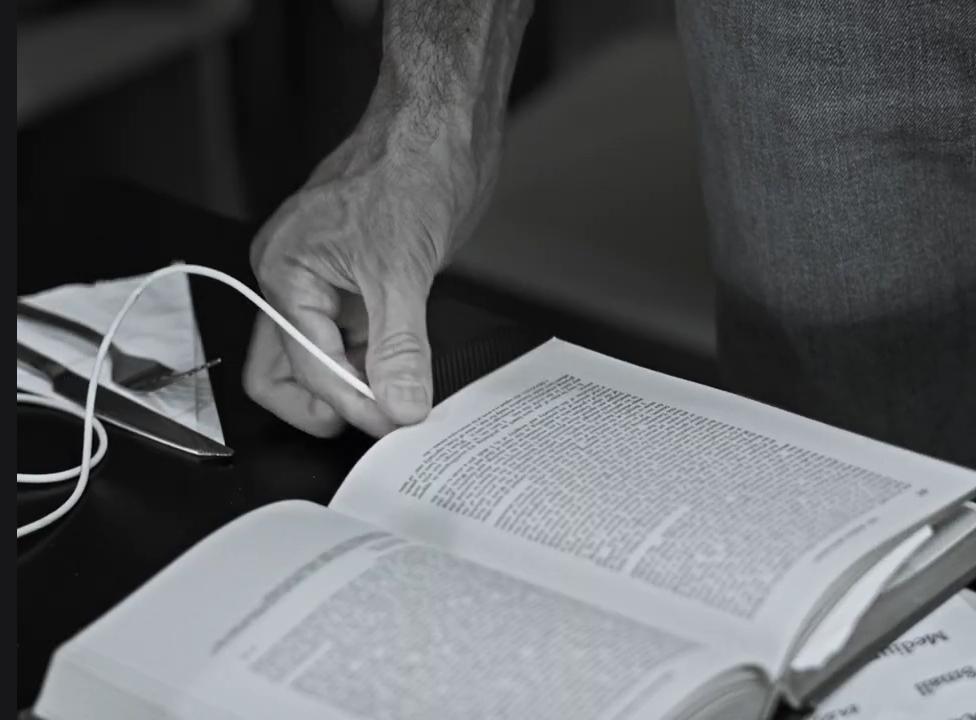 Find My Phone: An open book on a table