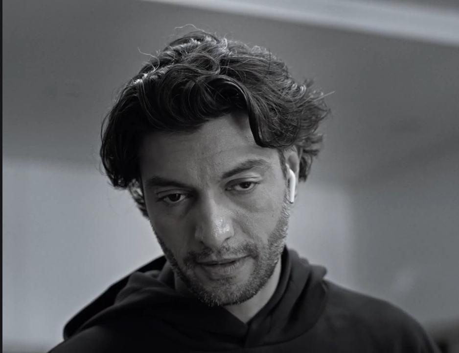 Find My Phone: Close-up of a man looking down